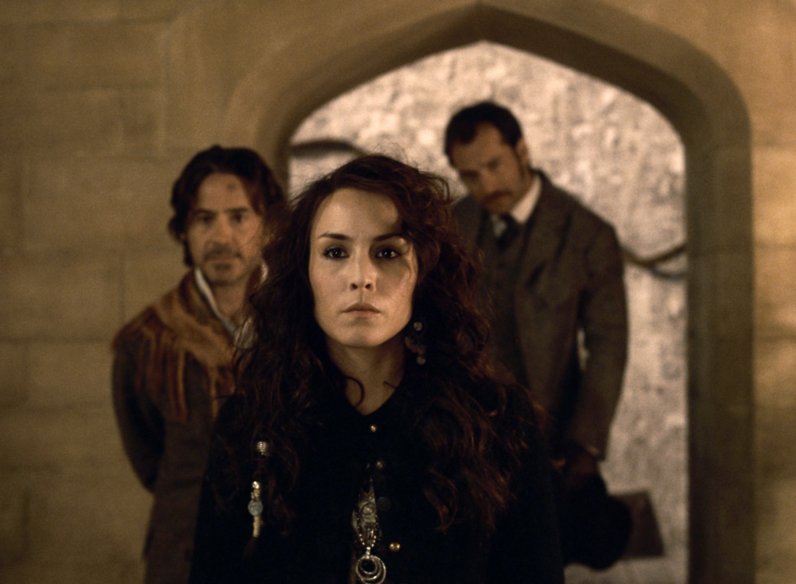 Robert Downey Jr., Noomi Rapace and Jude Law in Warner Bros. Pictures' Sherlock Holmes: A Game of Shadows (2011)