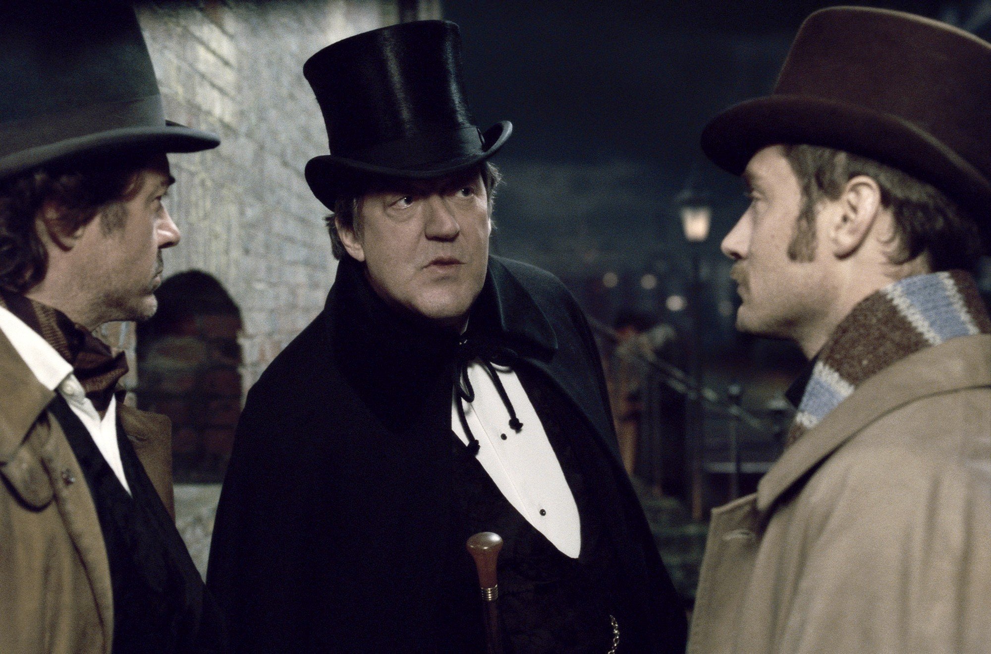 Robert Downey Jr., Stephen Fry and Jude Law in Warner Bros. Pictures' Sherlock Holmes: A Game of Shadows (2011)