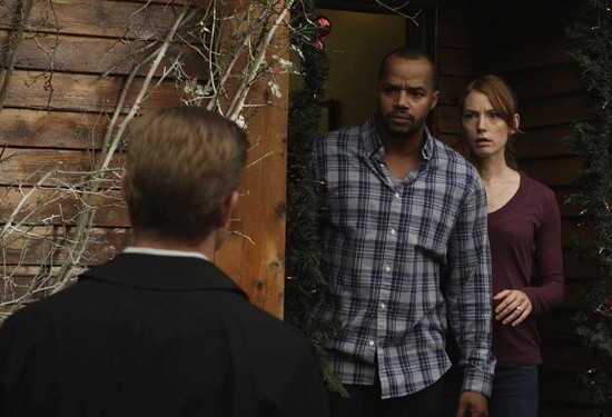Donald Faison stars as Ted and Alicia Witt stars as Meg in Lifetime's An Snow Globe Christmas (2013)