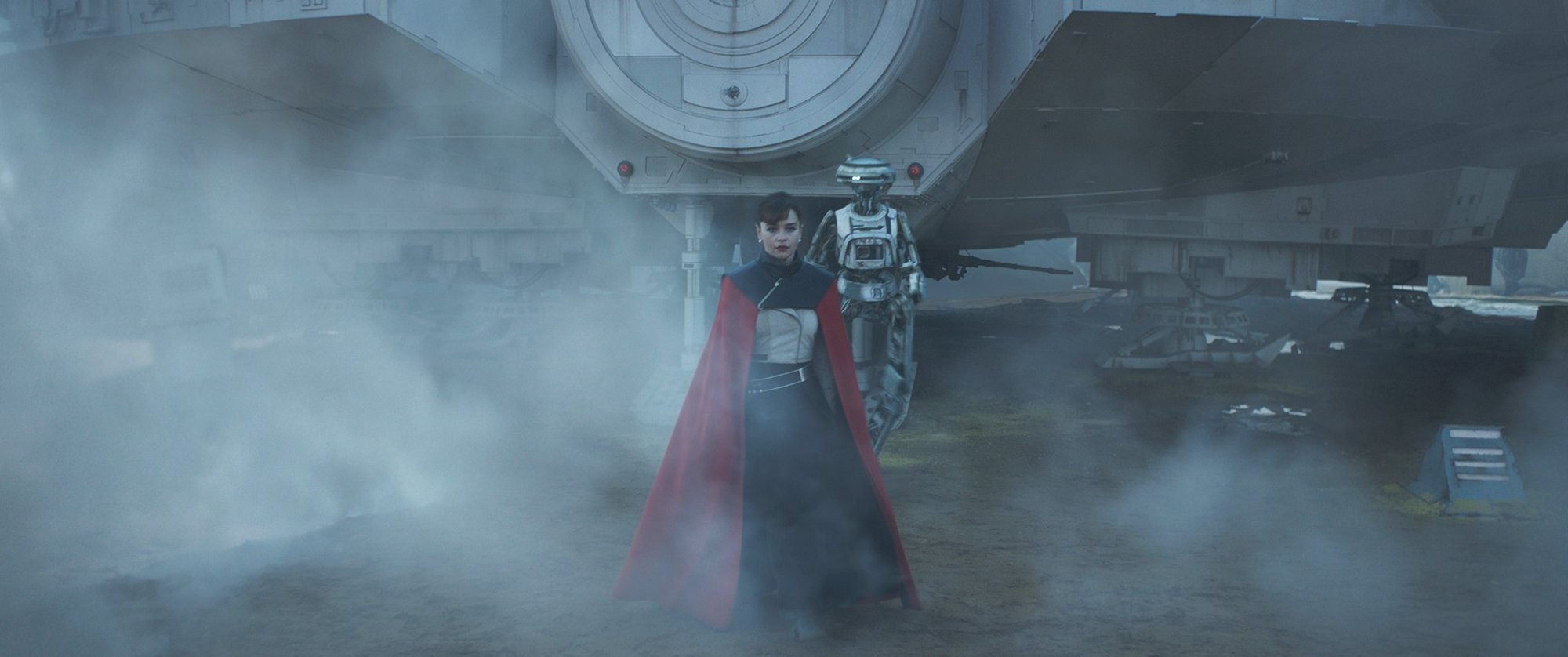 Qi'Ra (Emilia Clarke) and L3-37 from Walt Disney Pictures' Solo: A Star Wars Story (2018)