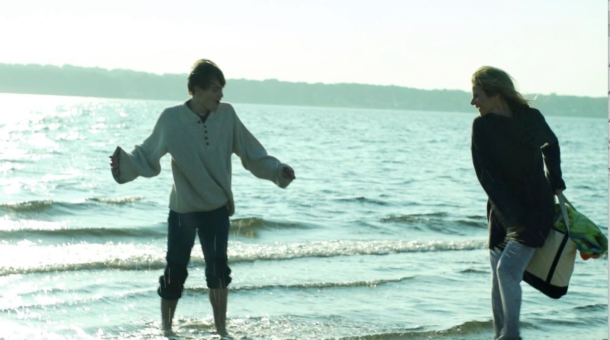 Graham Patrick Martin stars as Travis Tratten and Jessalyn Gilsig stars as Anna Thompson in Screen Media Films' Somewhere Slow (2014)