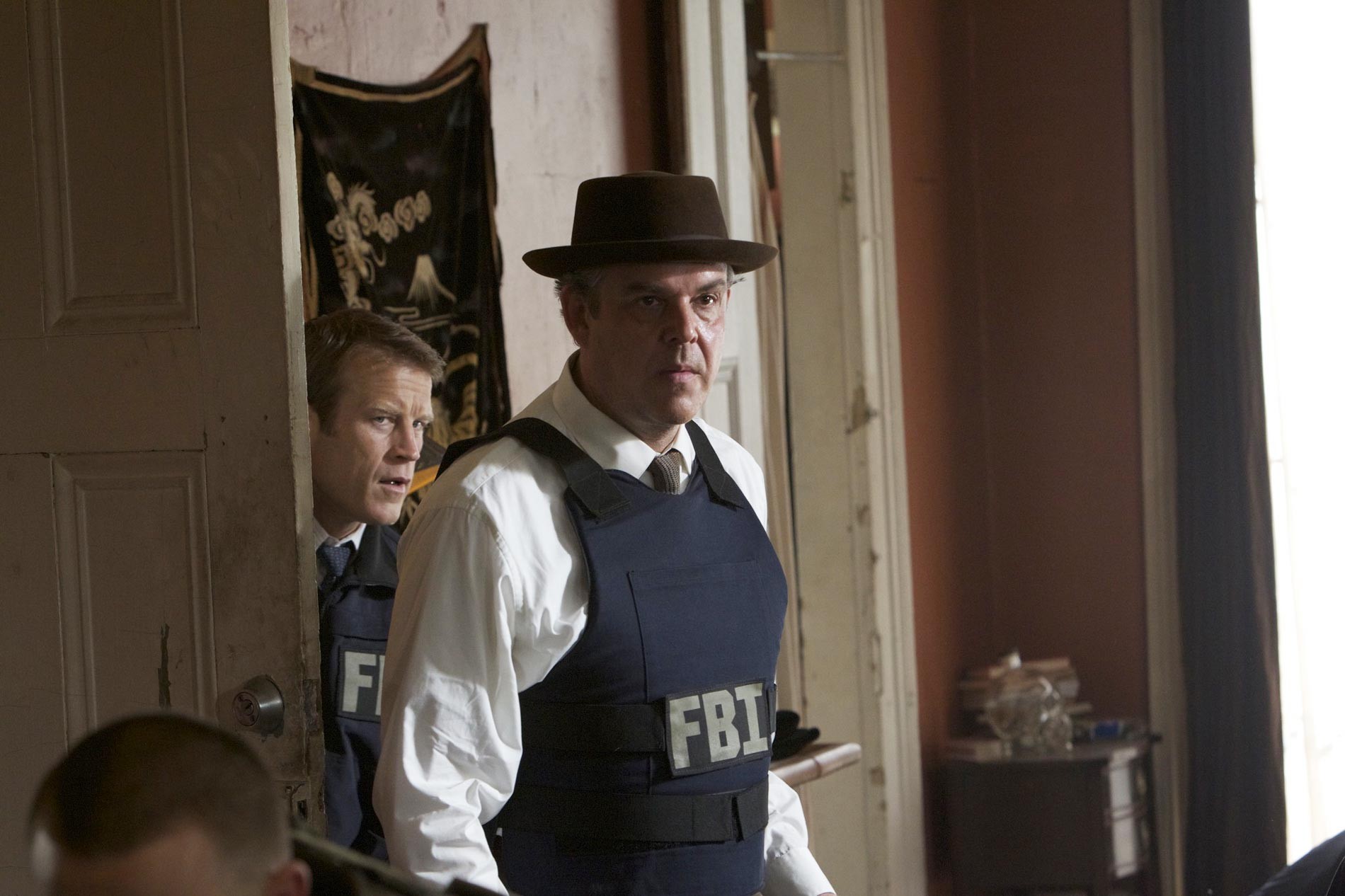 Mark Valley (stars as Fletcher) and Danny Huston in Millennium Films' Stolen (2012)