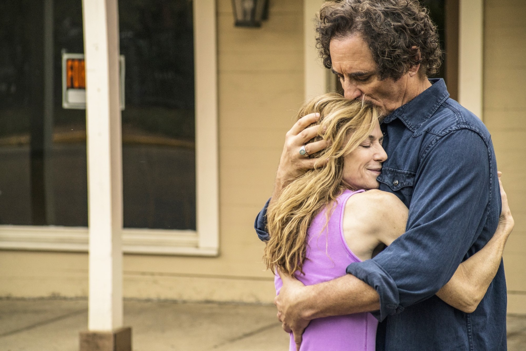 Holly Hunter stars as Darcy Baylor and Kim Coates stars as Clayton Watson in Brainstorm Media's Strange Weather (2017)