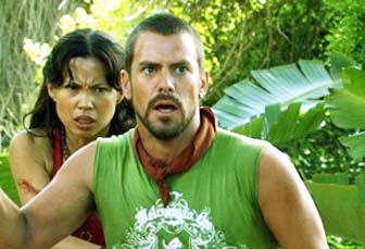 Natalie Jackson Mendoza stars as Cecilia 'Chill' Reyes and Colin Moss stars as Dexter 'Dex' Simms in Focus Films' Surviving Evil (2009)