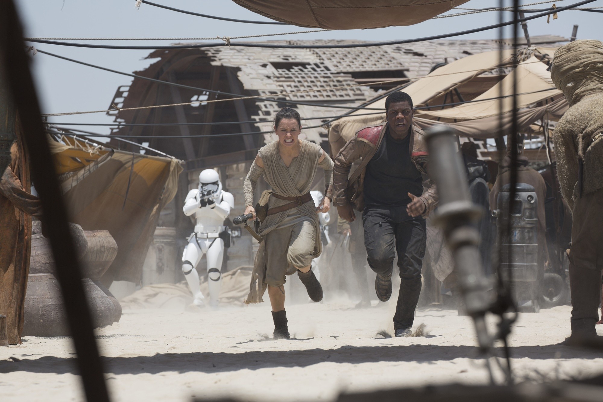 Daisy Ridley stars as Rey and John Boyega stars as Finn in Walt Disney Pictures' Star Wars: The Force Awakens (2015)