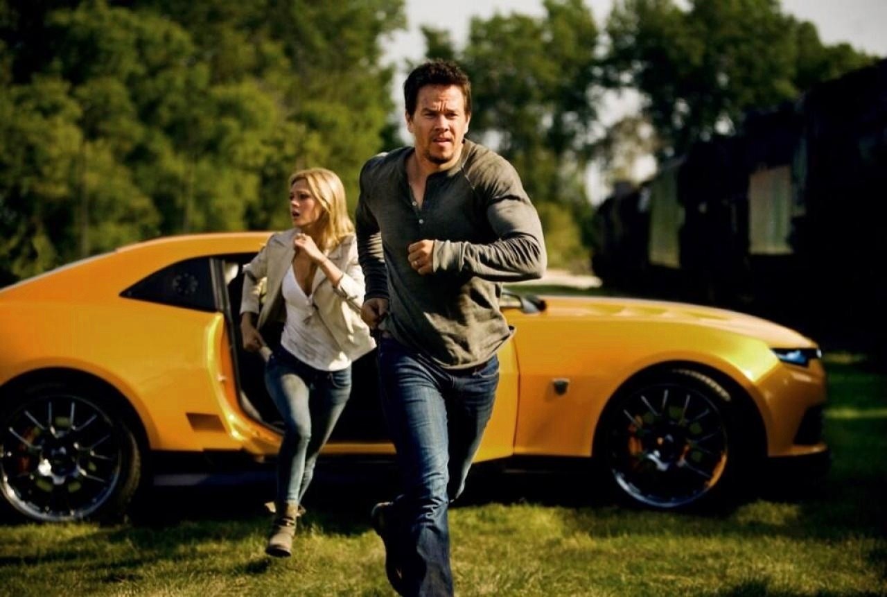 Nicola Peltz stars as Tessa Yeager and Mark Wahlberg stars as Cade Yeager in Paramount Pictures' Transformers: Age of Extinction (2014). Photo credit by Andrew Cooper.