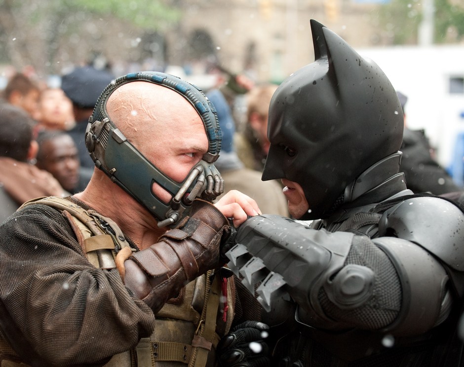 Tom Hardy stars as Bane and Christian Bale stars as Bruce Wayne/Batman in Warner Bros. Pictures' The Dark Knight Rises (2012)