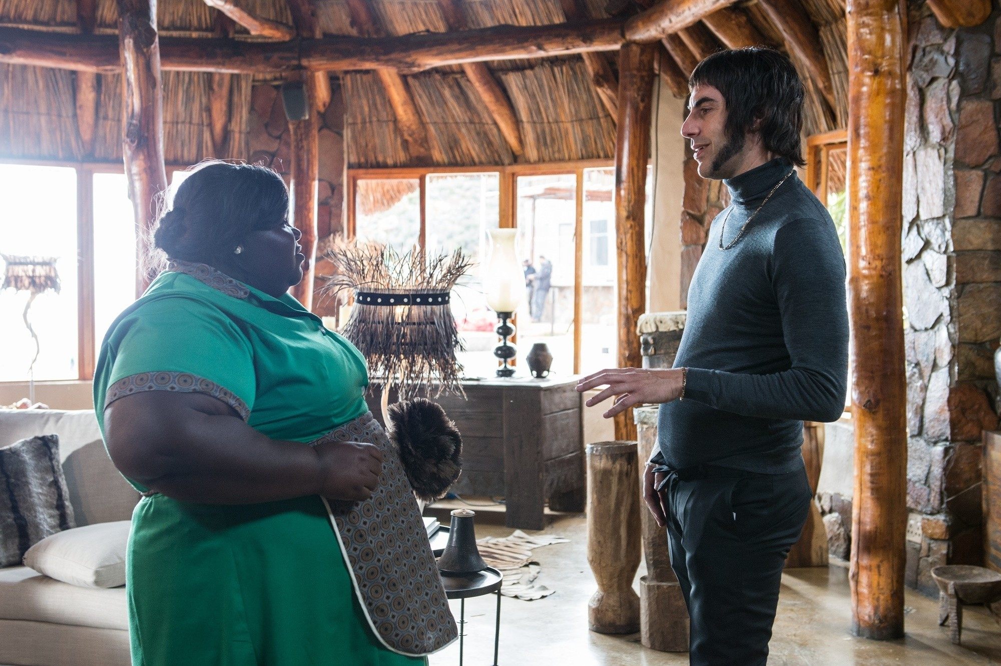 Gabourey Sidibe stars as Banu the Cleaner and Sacha Baron Cohen stars as Carl 'Nobby' Butcher in Columbia Pictures' The Brothers Grimsby (2016)