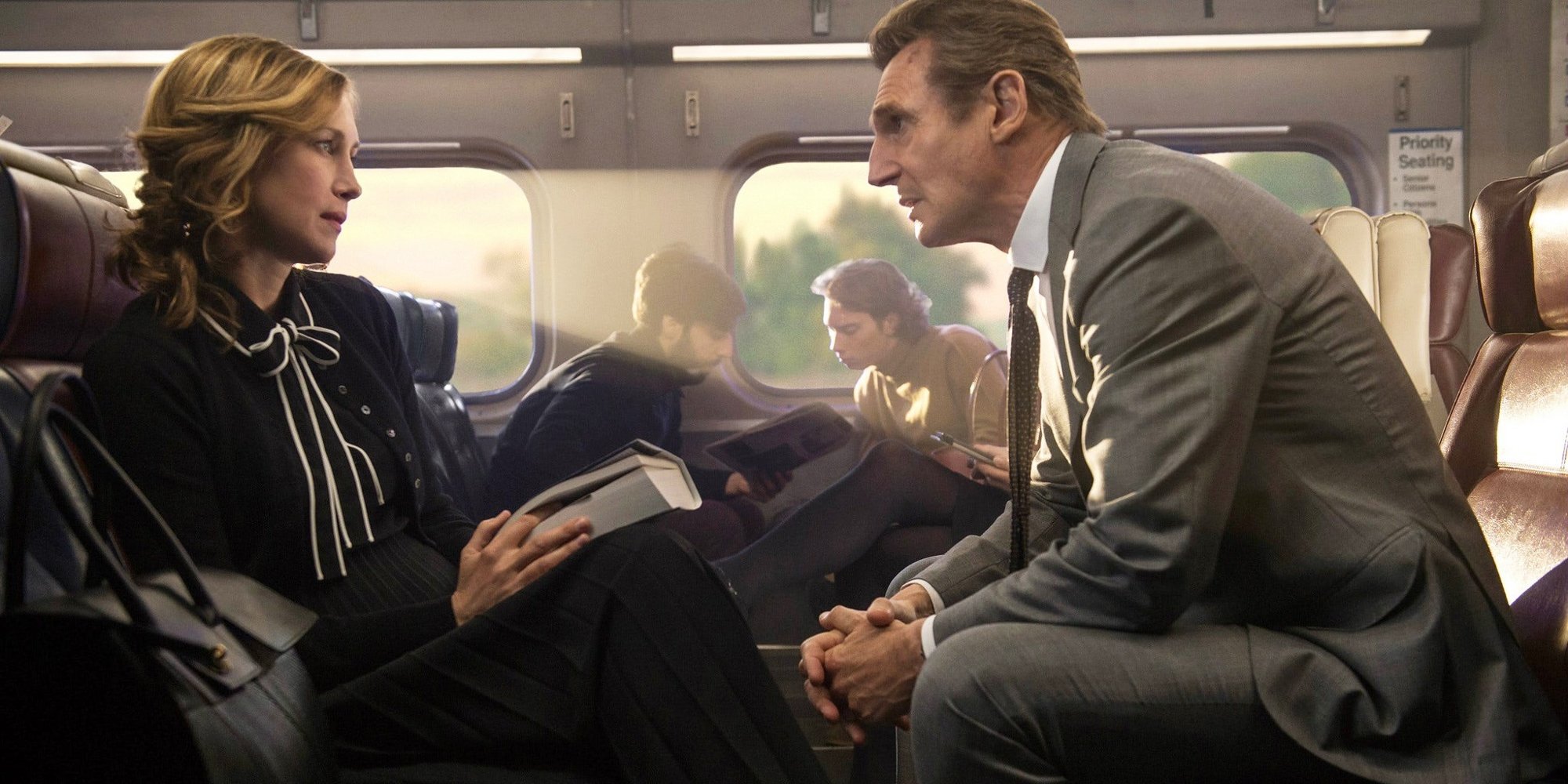 Vera Farmiga stars as Joanna and Liam Neeson stars as Michael Woolrich in Lionsgate Films' The Commuter (2018)