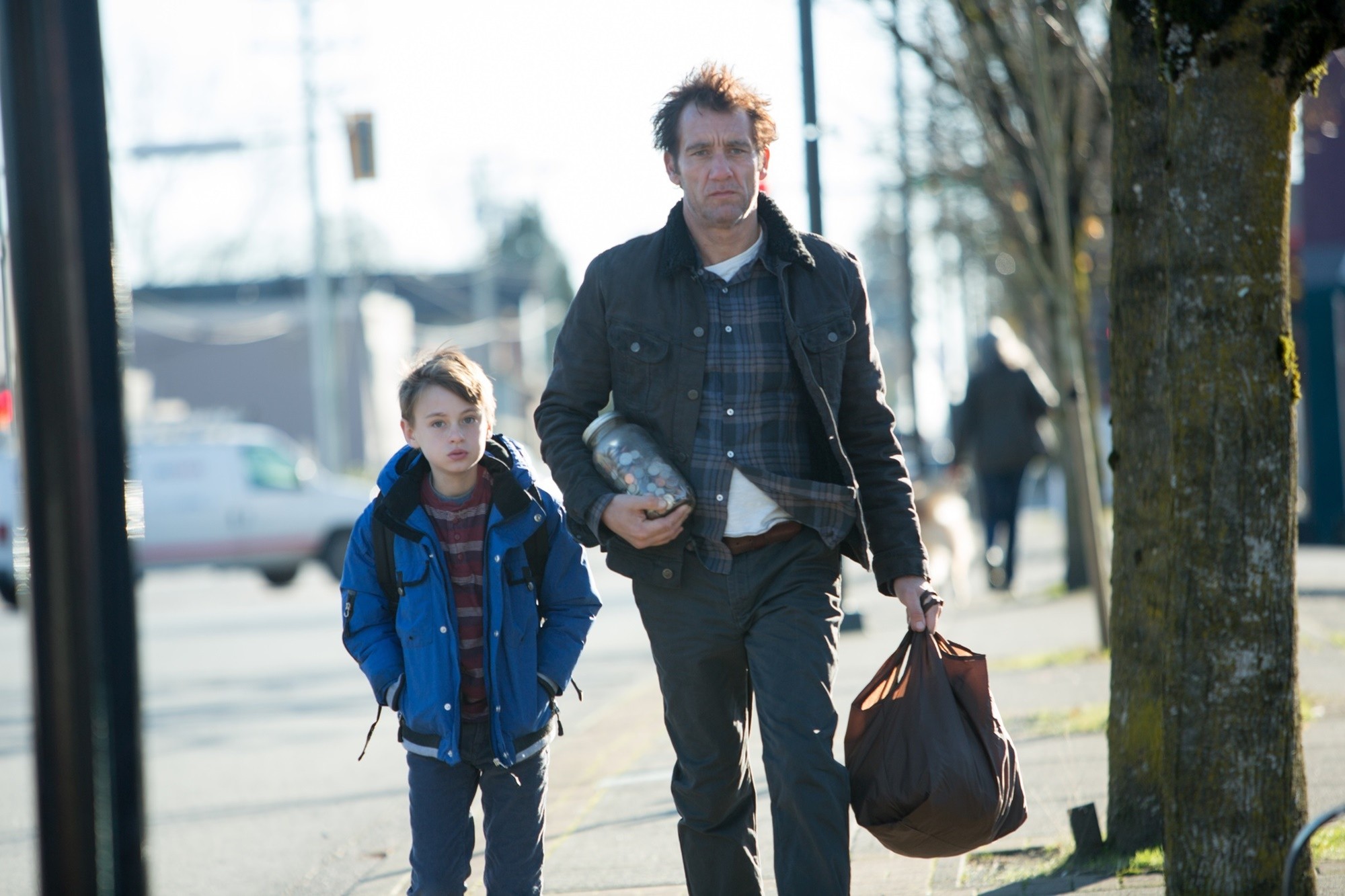 Jaeden Lieberher stars as Anthony and Clive Owen stars as Walt in Saban Films' The Confirmation (2016)