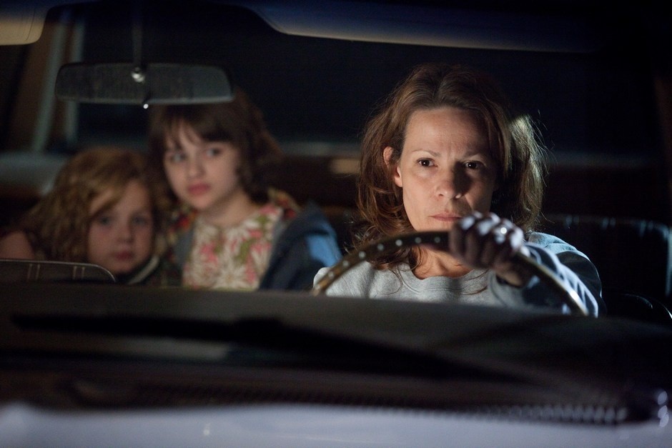 Kyla Deaver, Joey King and Lili Taylor in Warner Bros. Pictures' The Conjuring (2013)