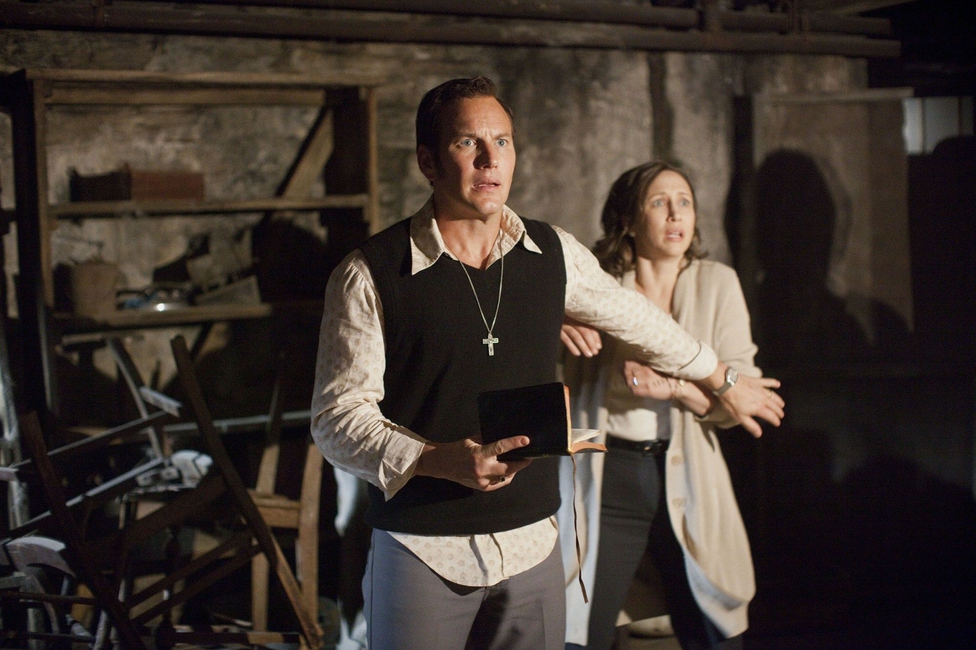 Patrick Wilson stars as Ed Warren and Vera Farmiga stars as Lorraine Warren in Warner Bros. Pictures' The Conjuring (2013)