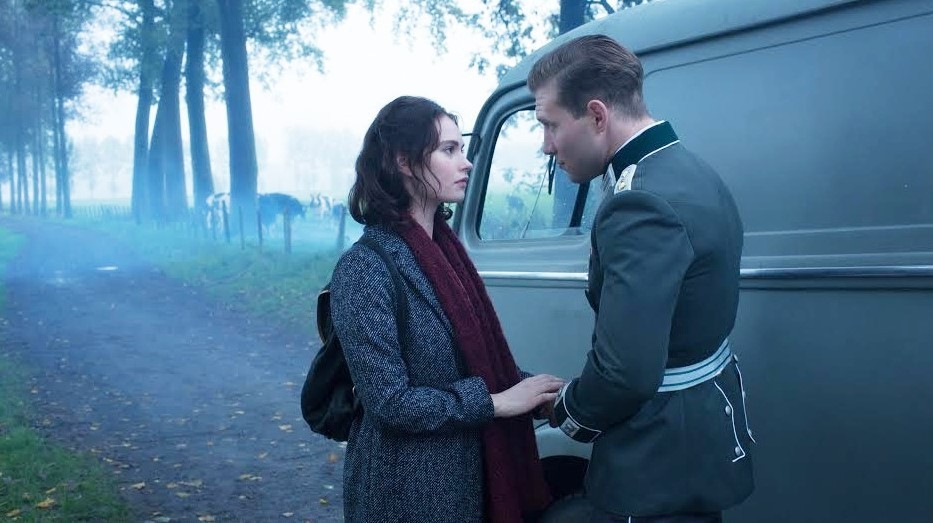 Lily James stars as Mieke de Jong and Jai Courtney stars as Capt. Stefan Brandt in A24's The Exception (2017)
