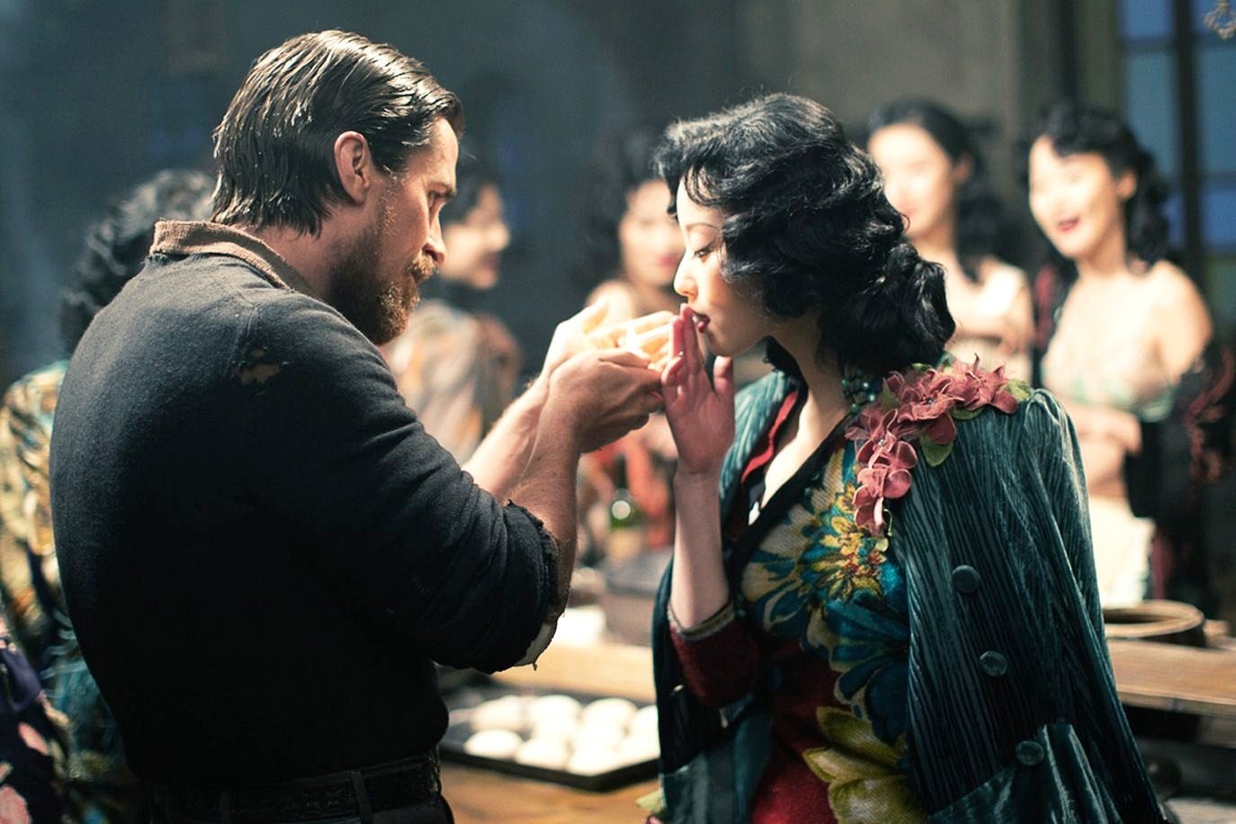 Christian Bale stars as John Miller and Ni Ni stars as Yu Mo in Wrekin Hill Entertainment's The Flowers of War (2012)