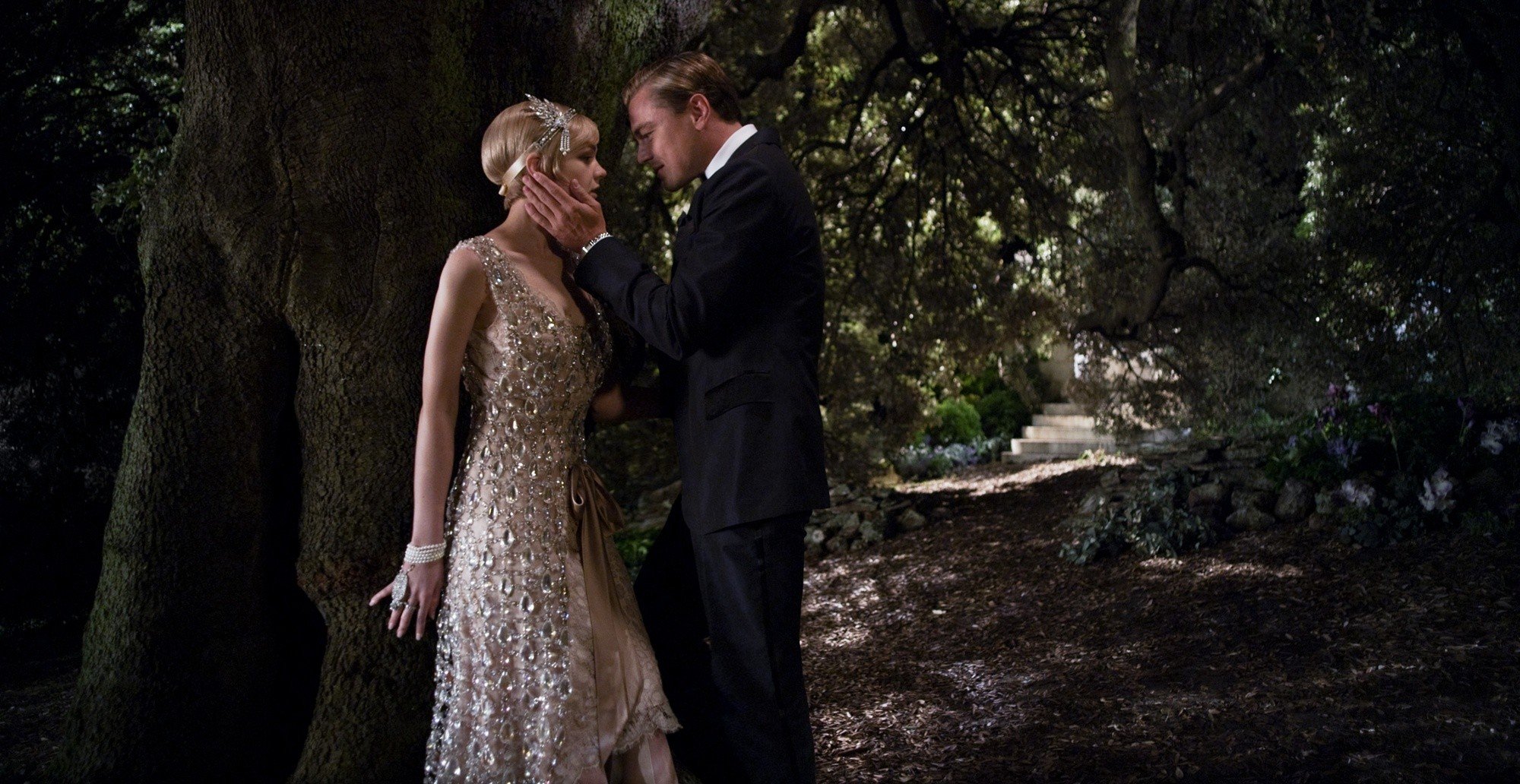 Carey Mulligan stars as Daisy Buchanan and Leonardo DiCaprio stars as Jay Gatsby in Warner Bros. Pictures' The Great Gatsby (2013)