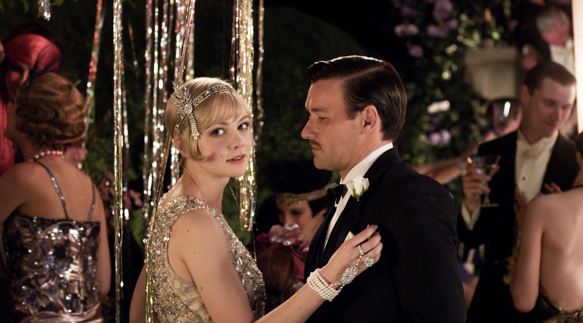 Carey Mulligan stars as Daisy Buchanan and Joel Edgerton stars as Tom Buchanan in Warner Bros. Pictures' The Great Gatsby (2013)