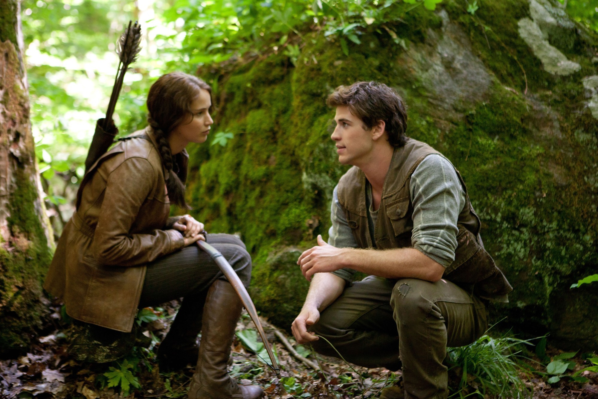 Jennifer Lawrence stars as Katniss Everdeen and Liam Hemsworth stars as Gale Hawthorne in Lionsgate Films' The Hunger Games (2012)