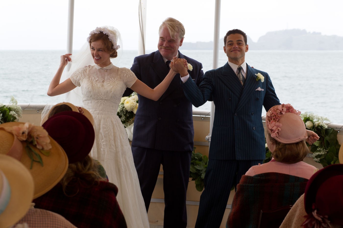 Ambyr Childers, Philip Seymour Hoffman and Rami Malek in The Weinstein Company's The Master (2012)