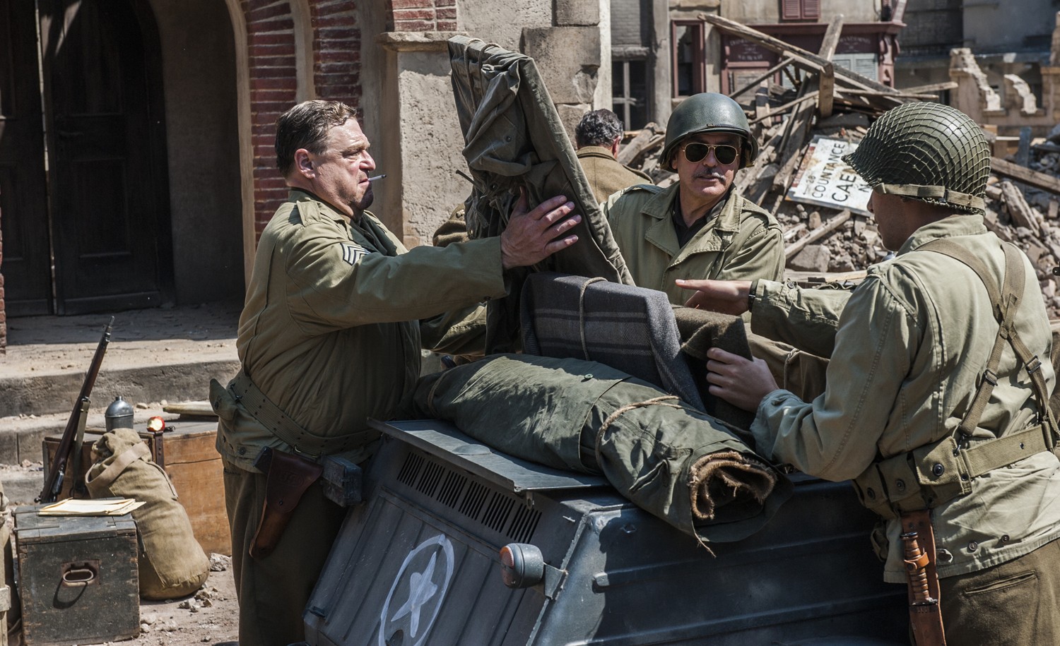 John Goodman stars as Walter Garfield and George Clooney stars as Frank Stokes in Columbia Pictures' The Monuments Men (2014)