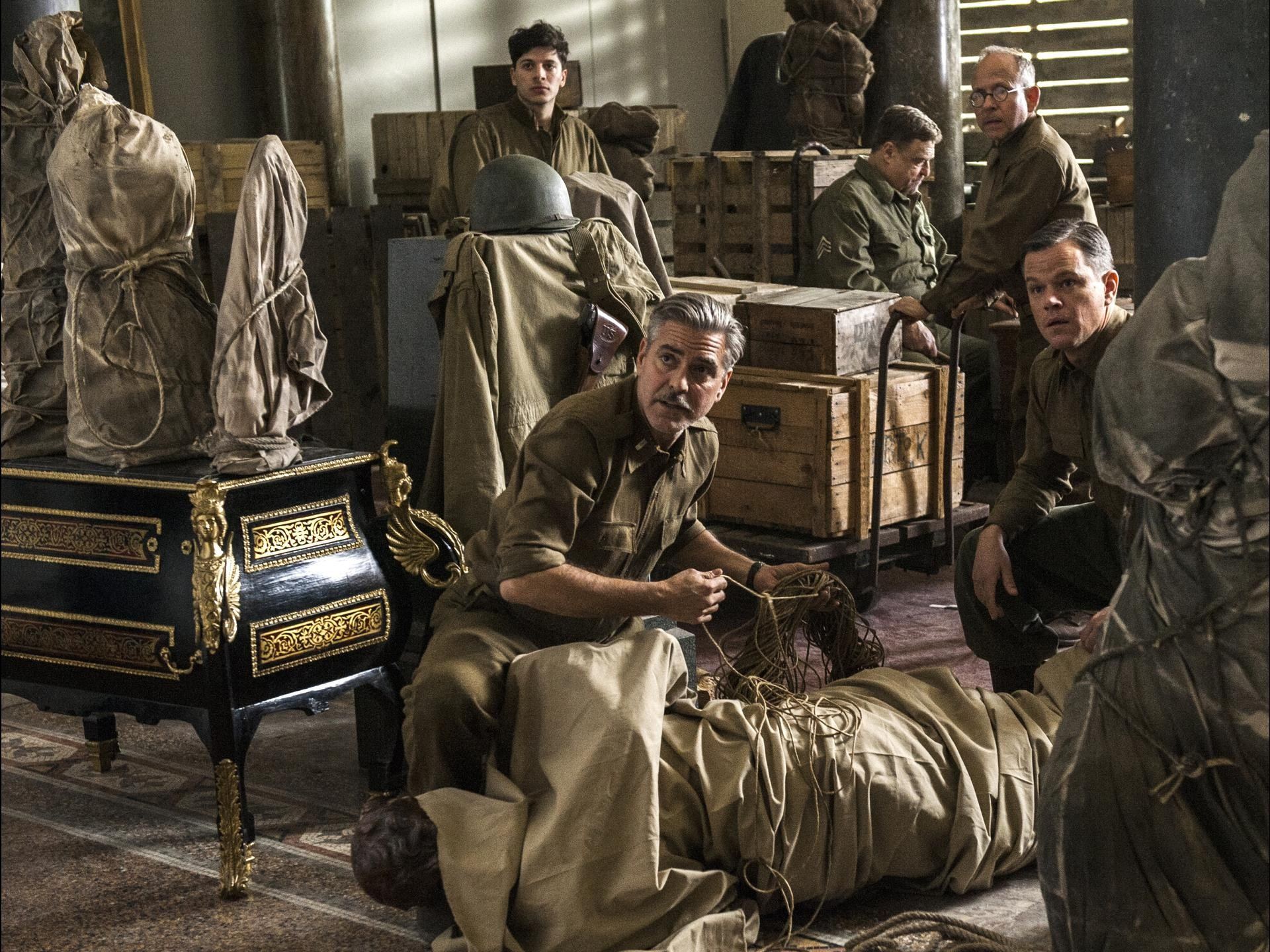 Dimitri Leonidas, George Clooney, John Goodman, Bob Balaban and Matt Damon in Columbia Pictures' The Monuments Men (2014). Photo credit by Claudette Barius.