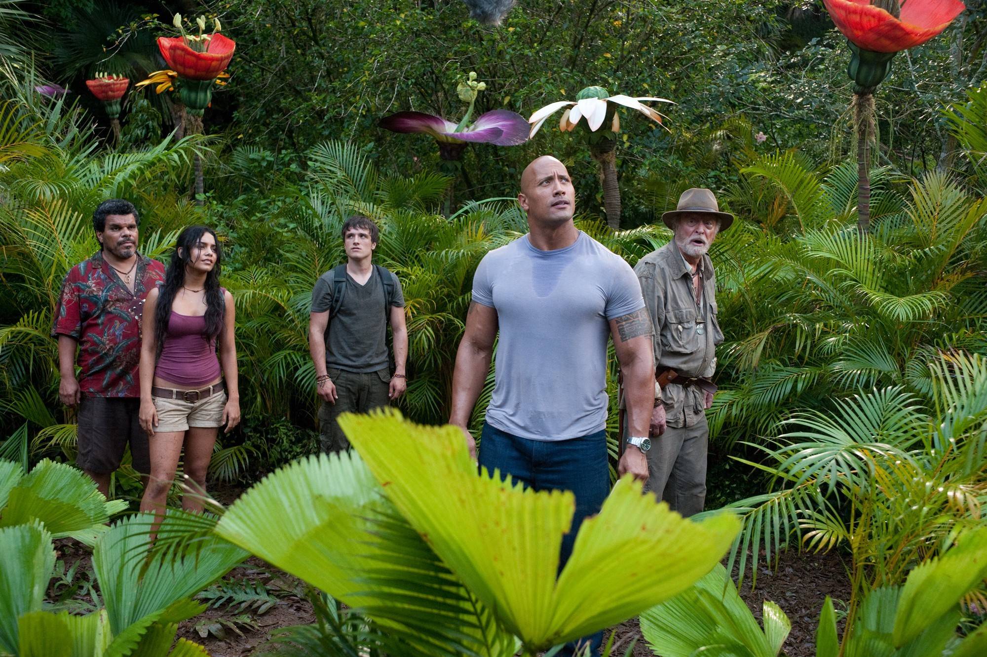 Luis Guzman, Vanessa Hudgens, Josh Hutcherson, The Rock and Michael Caine in Warner Bros. Pictures' Journey 2: The Mysterious Island (2012)