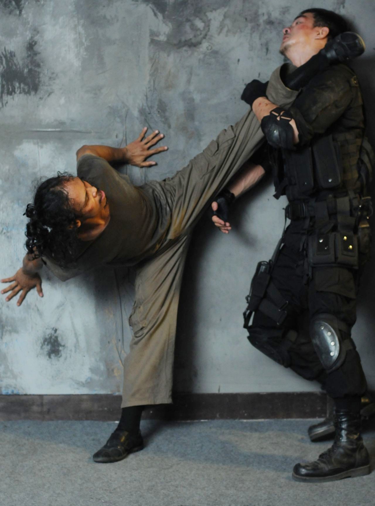 Yayan Ruhian stars as Yayan Ruhian in Mad Dog in Sony Pictures Classics' The Raid: Redemption (2012)