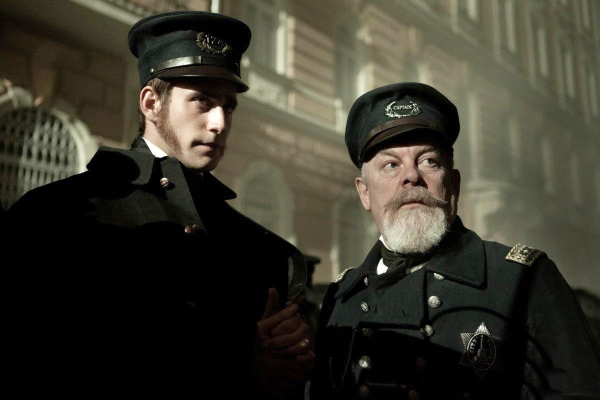 Oliver Jackson-Cohen stars as John Cantrell and Brendan Gleeson stars as Captain Hamilton in Relativity Media's The Raven (2012)