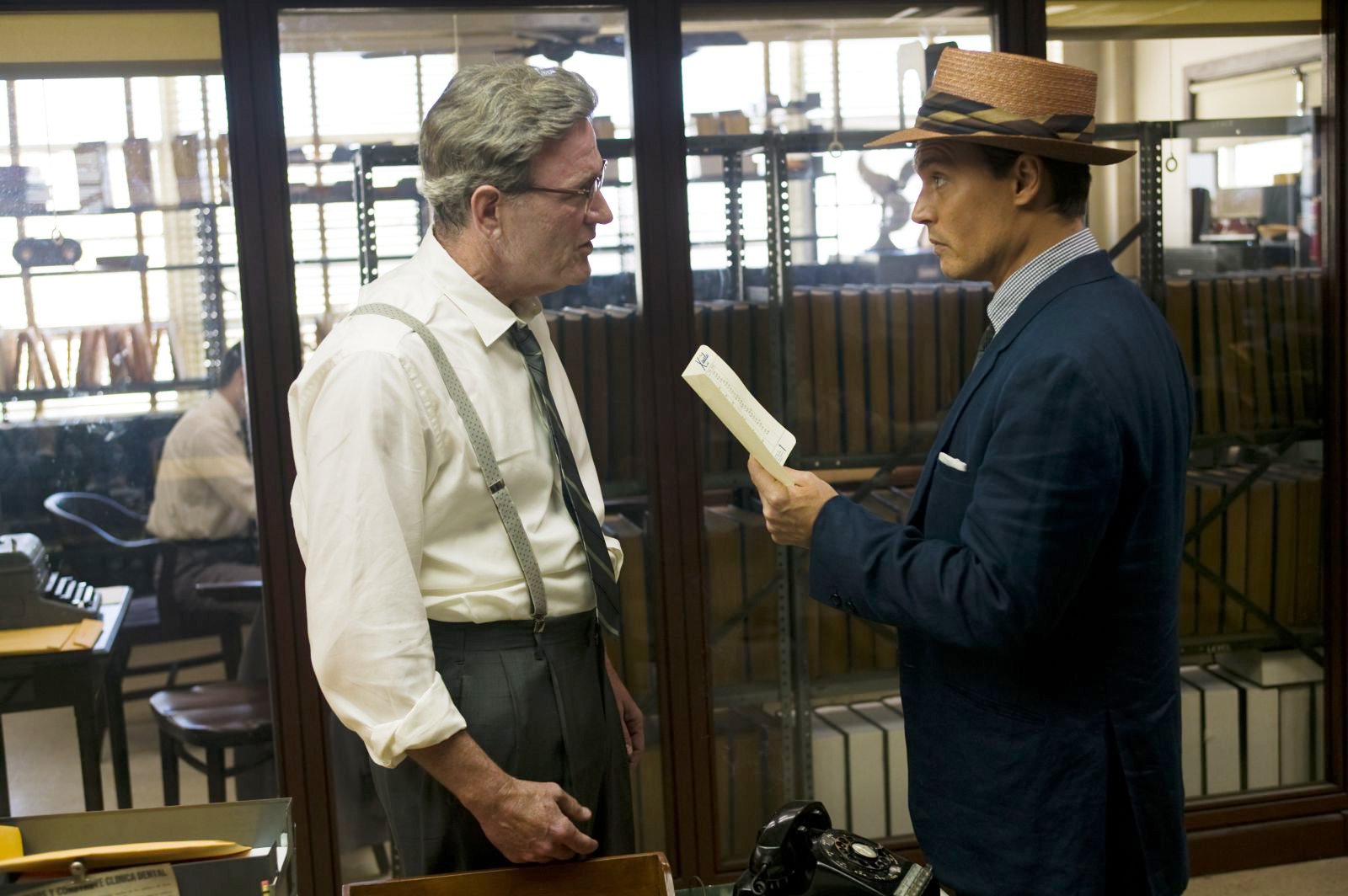 Richard Jenkins stars as Lotterman and Johnny Depp stars as Paul Kemp in FilmDistrict's The Rum Diary (2011). Photo credit by Peter Mountain.