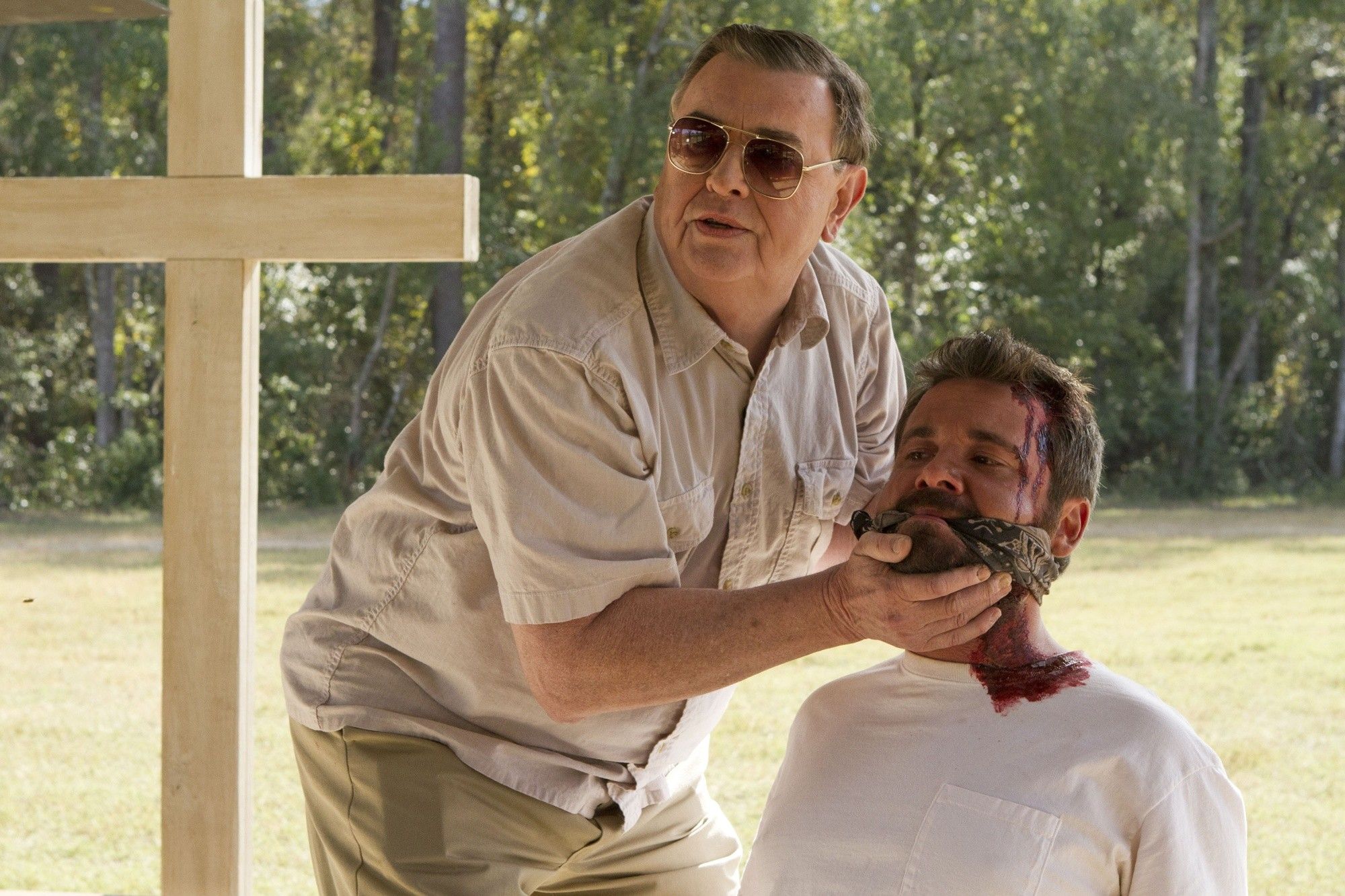 Gene Jones stars as Father and AJ Bowen stars as Sam in Magnolia Pictures' The Sacrament (2014)
