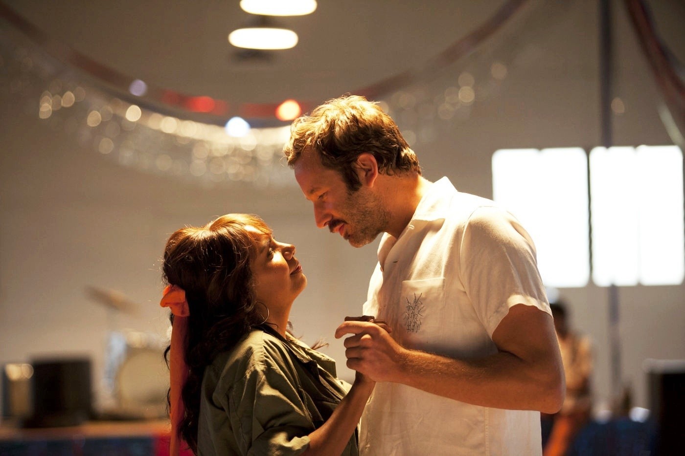 Deborah Mailman stars as Gail and Chris O'Dowd stars as Dave in The Weinstein Company's The Sapphires (2013)