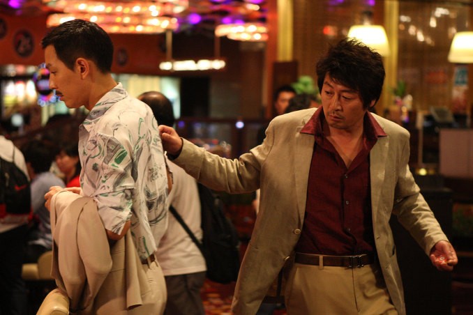 Lee Jung Jae stars as Popeye and Kim Yoon Seok stars as Macau Park in Well Go USA's The Thieves (2012)