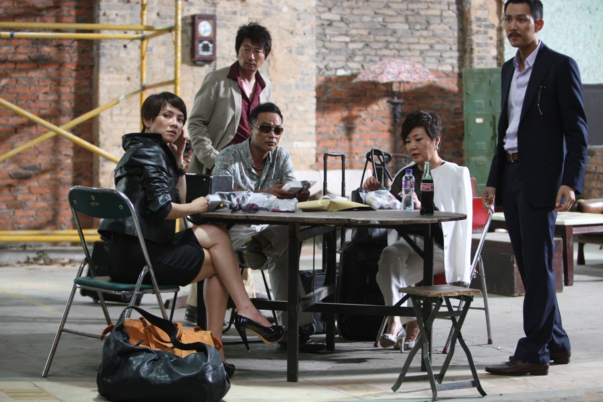 Angelica Lee, Kim Yun Seok, Simon Yam, Kim Hae Sook and Lee Jung Jae in Well Go USA's The Thieves (2012)