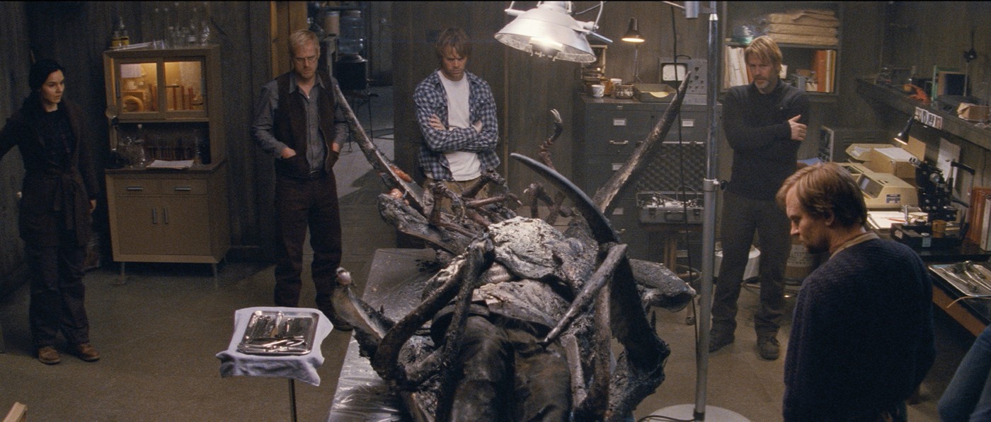 Kim Bubbs, Eric Christian Olsen and Trond Espen Seim in Universal Pictures' The Thing (2011)