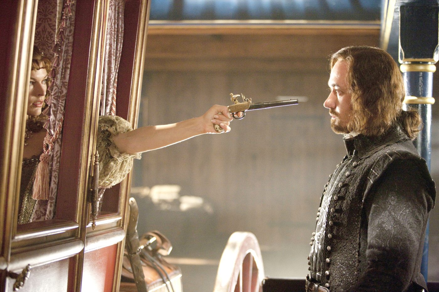 Milla Jovovich stars as M'lady De Winter and Matthew Macfadyen stars as Athos in Summit Entertainment's The Three Musketeers (2011)