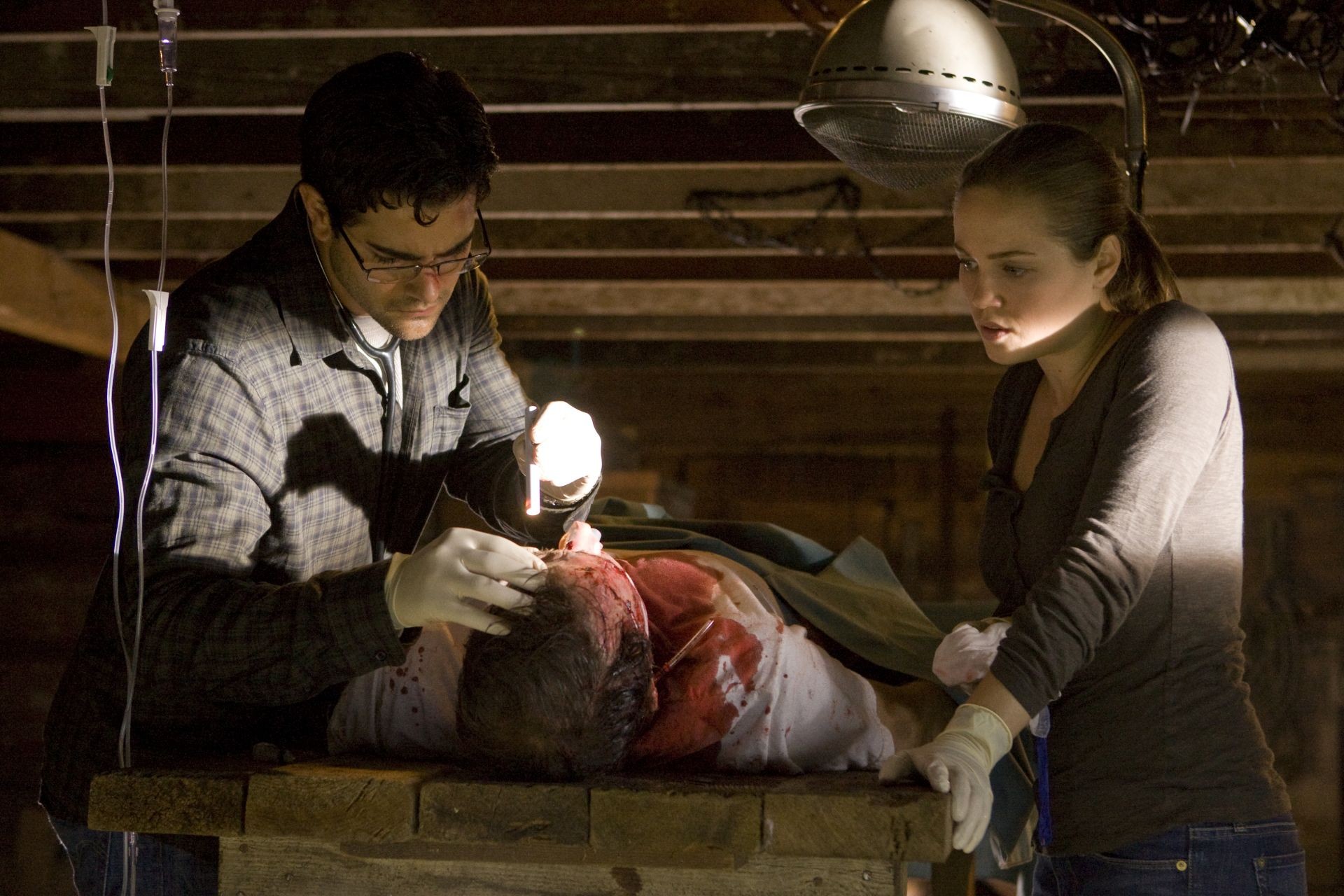 Jesse Metcalfe stars as Craig Landry and Erika Christensen stars as Elise Landry in IFC Films' The Tortured (2012). Photo credit by Bob Akester.