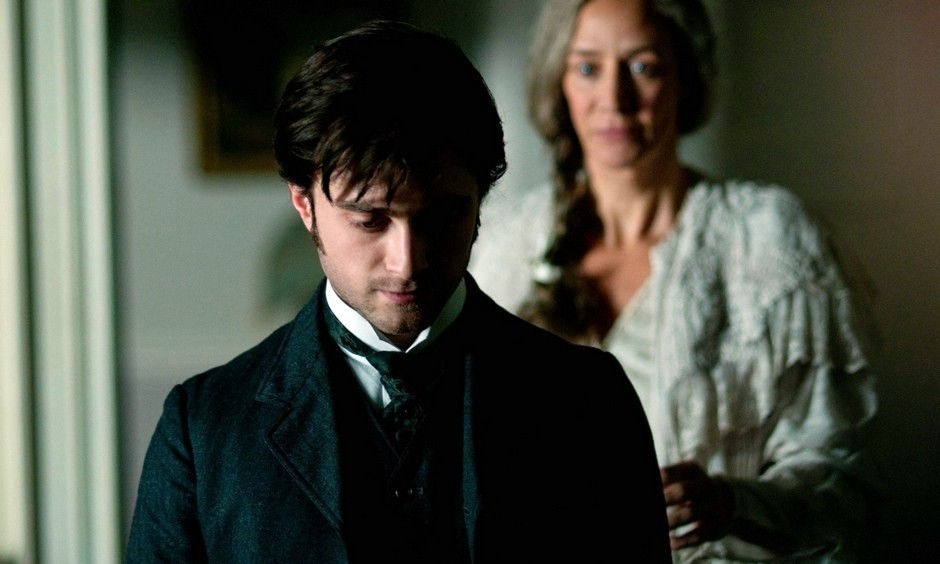 Daniel Radcliffe stars as Arthur Kipps and Janet McTeer stars as Mrs. Daily in CBS Films' The Woman in Black (2012)