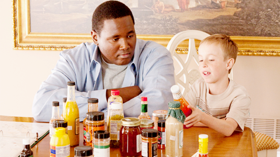 Quinton Aaron stars as Michael Oher and Jae Head stars as S.J. in The 20th Century Fox's The Blind Side (2009)