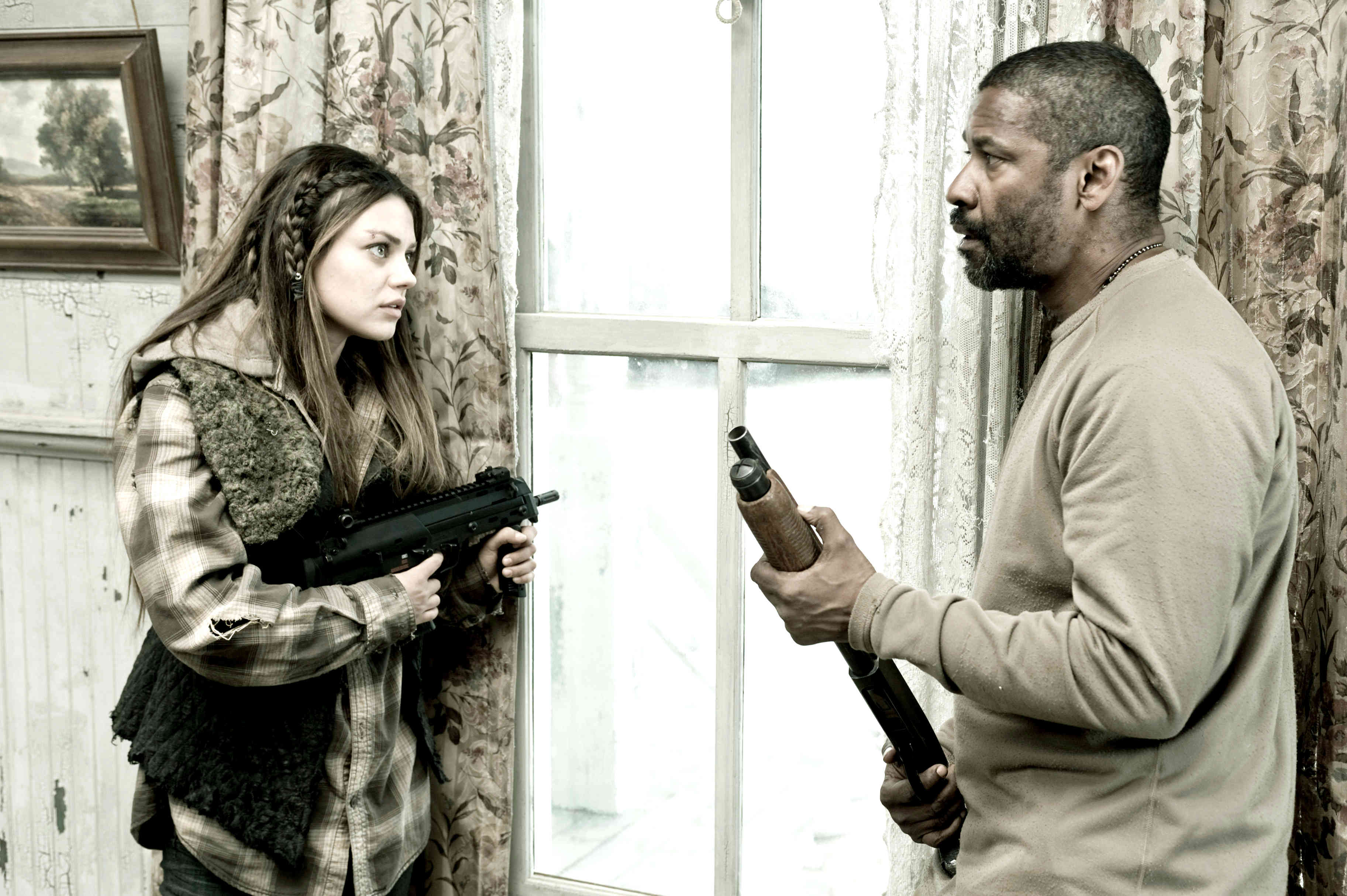 Mila Kunis stars as Solara and Denzel Washington stars as Eli in Warner Bros. Pictures' The Book of Eli (2010)