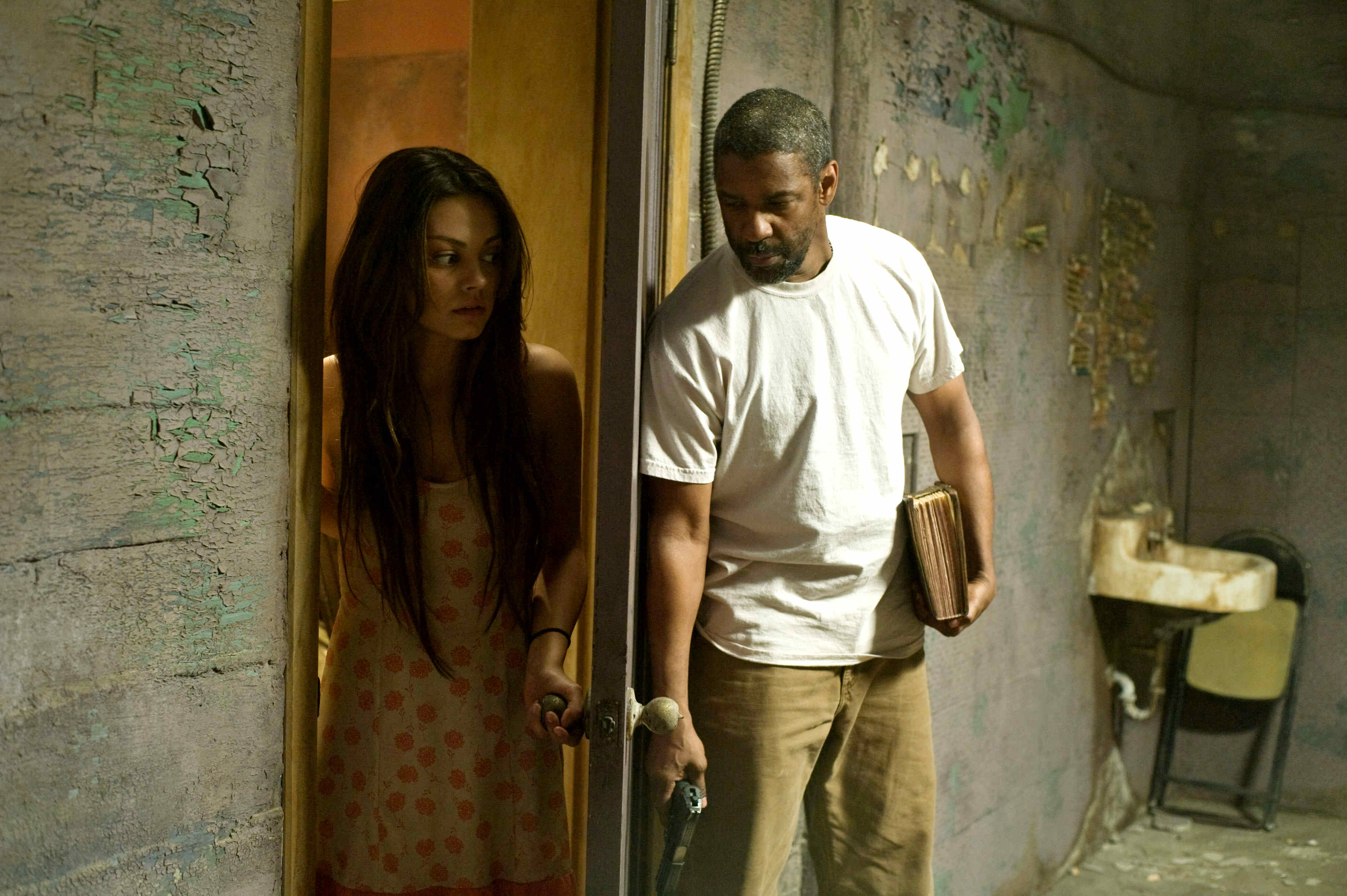 Mila Kunis stars as Solara and Denzel Washington stars as Eli in Warner Bros. Pictures' The Book of Eli (2010)