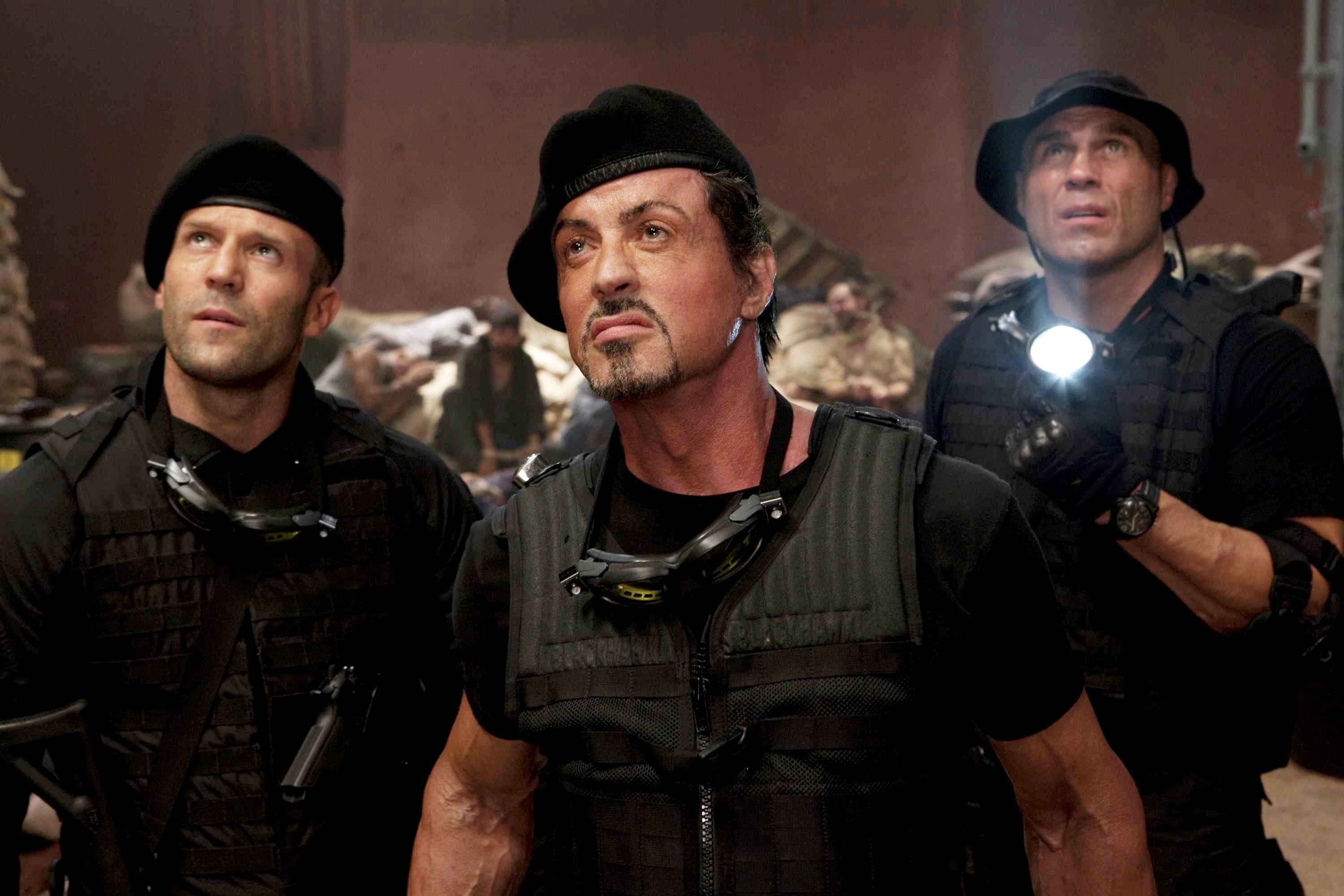 Jason Statham, Sylvester Stallone and Randy Couture in Lionsgate Films' The Expendables (2010). Photo credit by Karen Ballard.