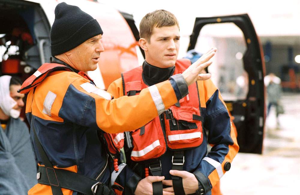 Kevin Costner as Ben Randall and Ashton Kutcher as Jake Fischer in Buena Vista Pictures' The Guardian (2006)