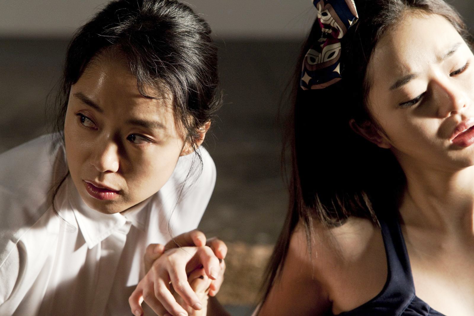 Joen Do-yeon stars as Eun-yi and Seo Woo stars as Haera in IFC Films' The Housemaid (2011)
