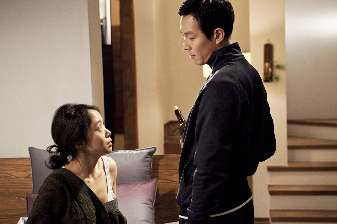 Lee Jung-jae stars as Hoon and Jeon Do-yeon stars as Eun-yi in IFC Films' The Housemaid (2011)