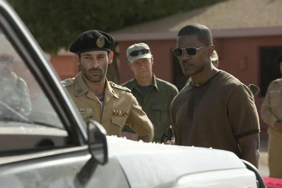 Ashraf Barhom as Col. Al-Ghazi and Jamie Foxx as Ronald Fluery in Universal Pictures' The Kingdom (2007)