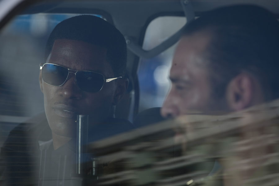 Ashraf Barhom as Col. Al-Ghazi and Jamie Foxx as Ronald Fluery in Universal Pictures' The Kingdom (2007)