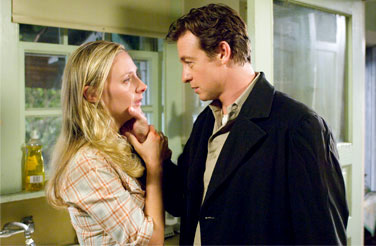 Hope Davis stars as Ellen and Simon Baker stars as Malcolm in Sony Pictures Home Entertainment's The Lodger (2009)