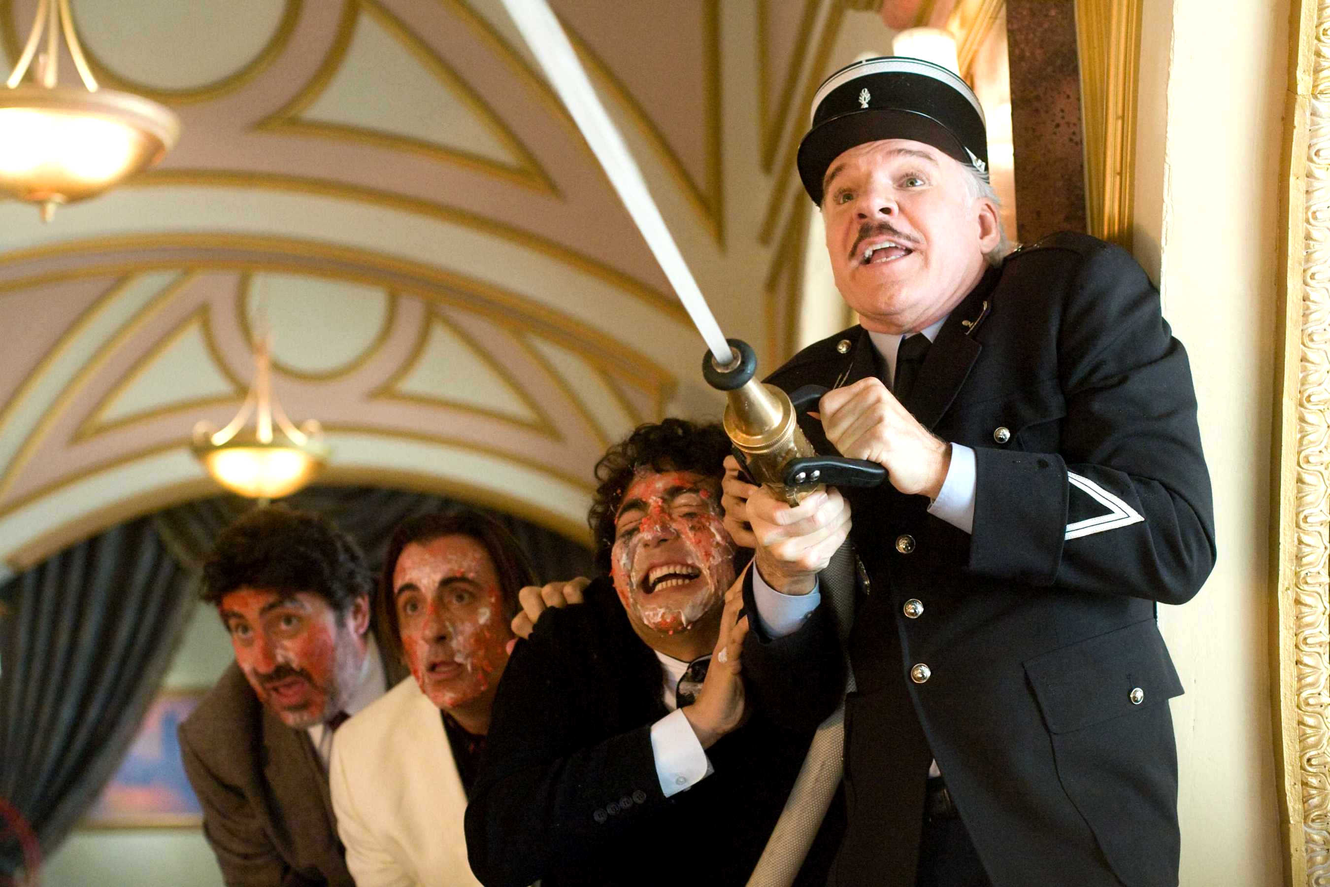 Alfred Molina, Andy Garcia, Yuki Matsuzaki and Steve Martin in Columbia Pictures' The Pink Panther 2 (2009). Photo credit by Peter Iovino.