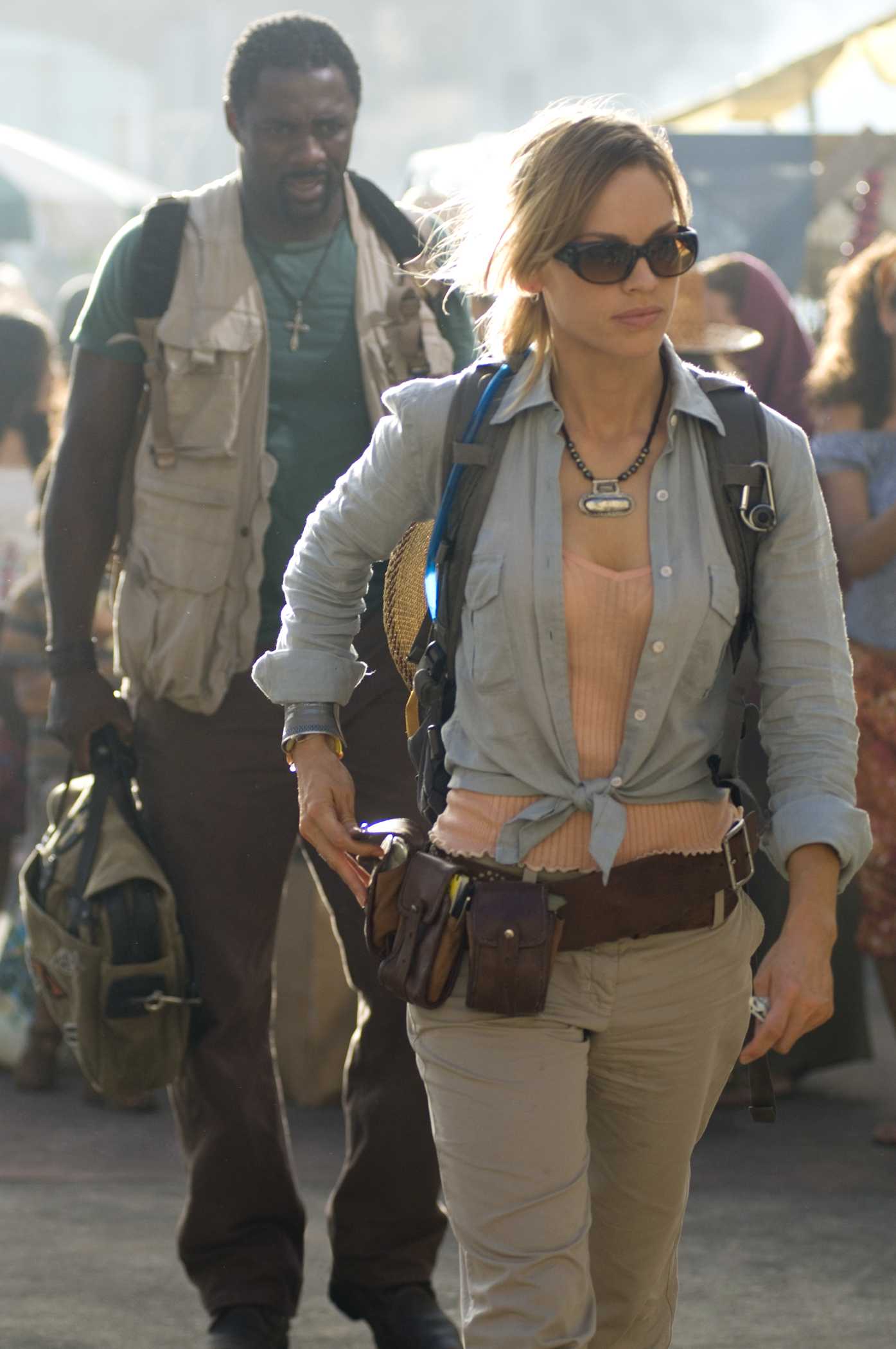 IDRIS ELBA as Ben (in background) and HILARY SWANK as Katherine in Warner Bros. Pictures' The Reaping (2006)