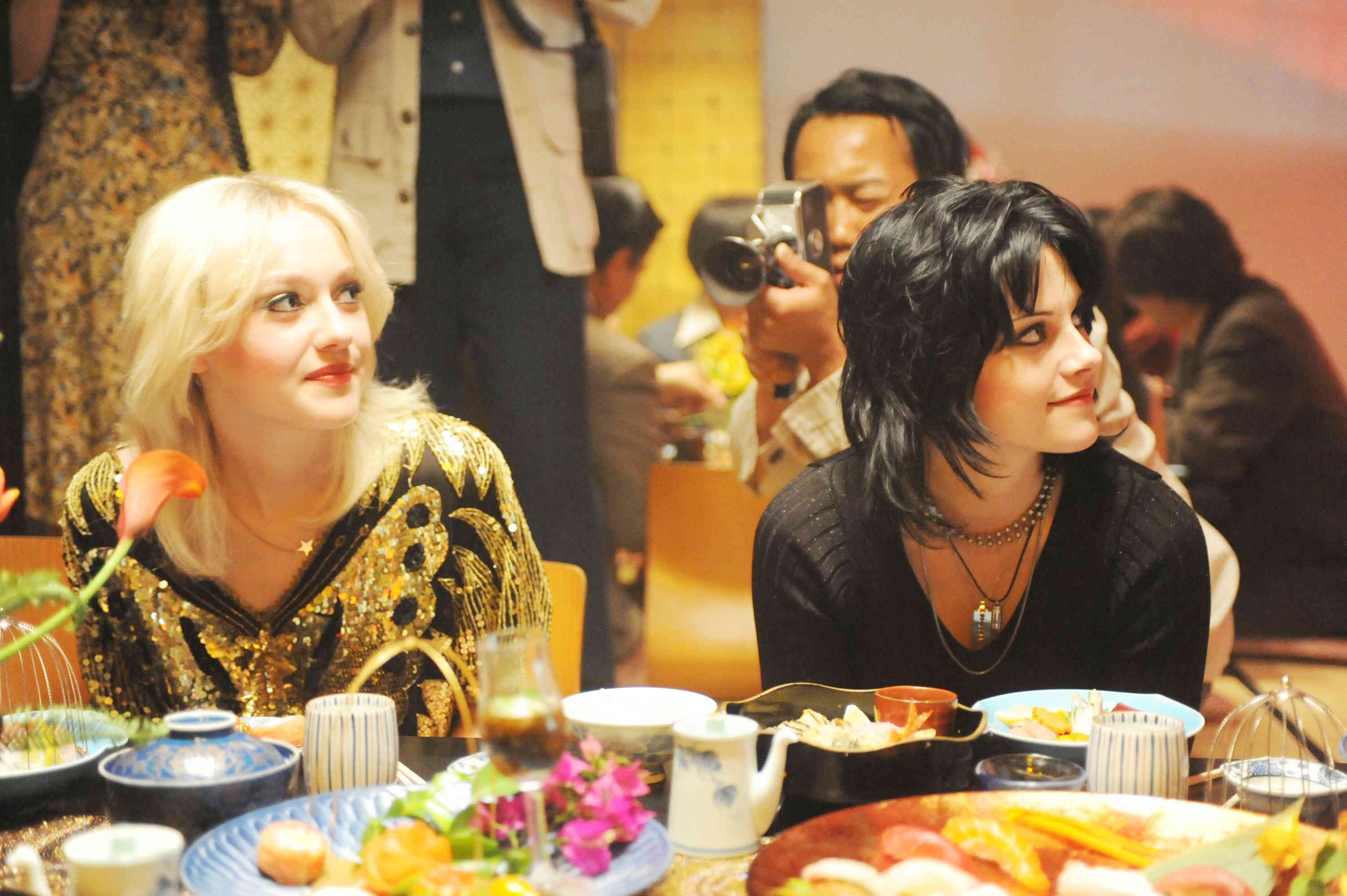 Dakota Fanning stars as Cherie Currie and Kristen Stewart stars as Joan Jett in Apparition's The Runaways (2010)