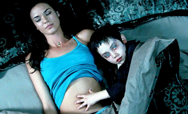 Odette Yustman stars as Casey Beldon and Ethan Cutkosky stars as Barto in Rogue Pictures' The Unborn (2009)
